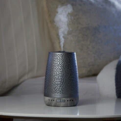 Yankee Candle Peaceful Dreams Silver Sleep Diffuser Starter Kit With 3 Refills 13 Yankee Candle Peaceful Dreams Silver Sleep Diffuser Starter Kit With 3 Refills -Yankee Candle Shop yankee candle peaceful dreams sleep diffuser stater kit bundle lifestyle 3